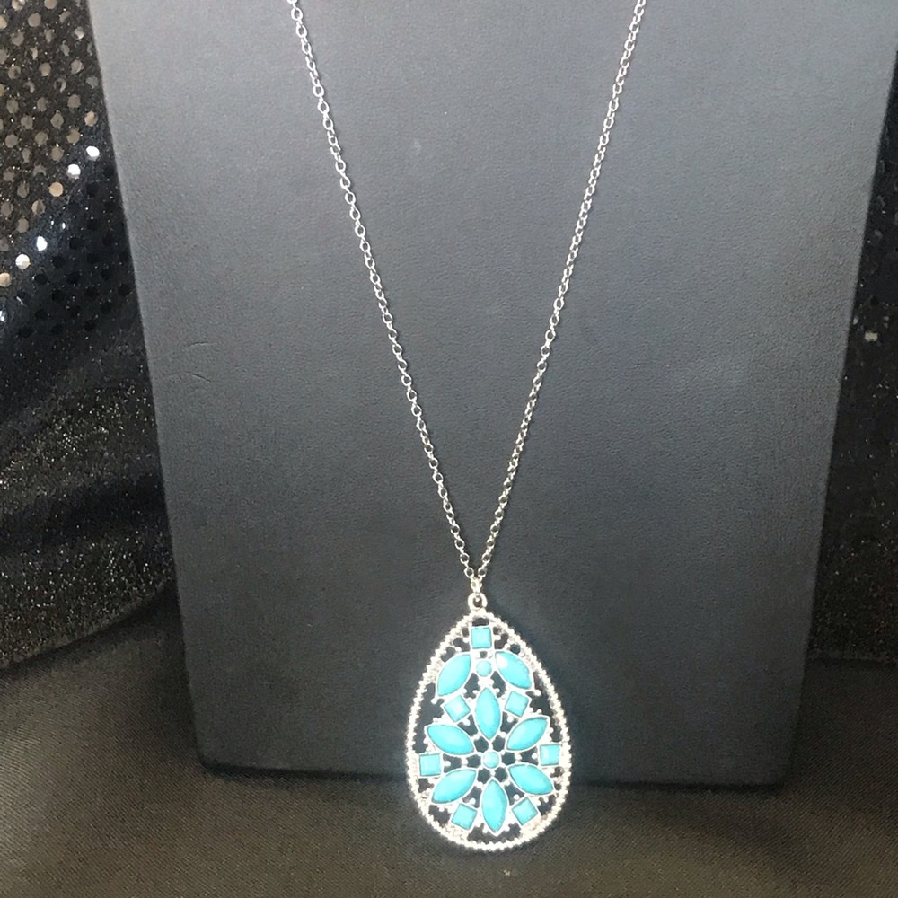 Long silver necklace with turquoise pendant